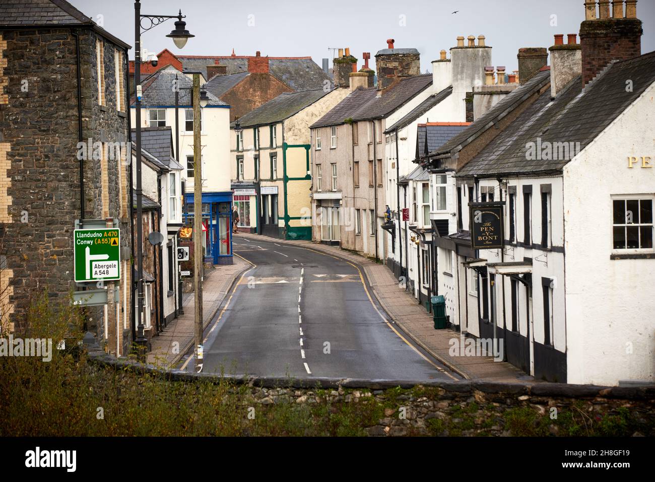 Llanrwst village shops  A470 Bridge Street in Snowdonia, Gwynedd, North Wales Stock Photo
