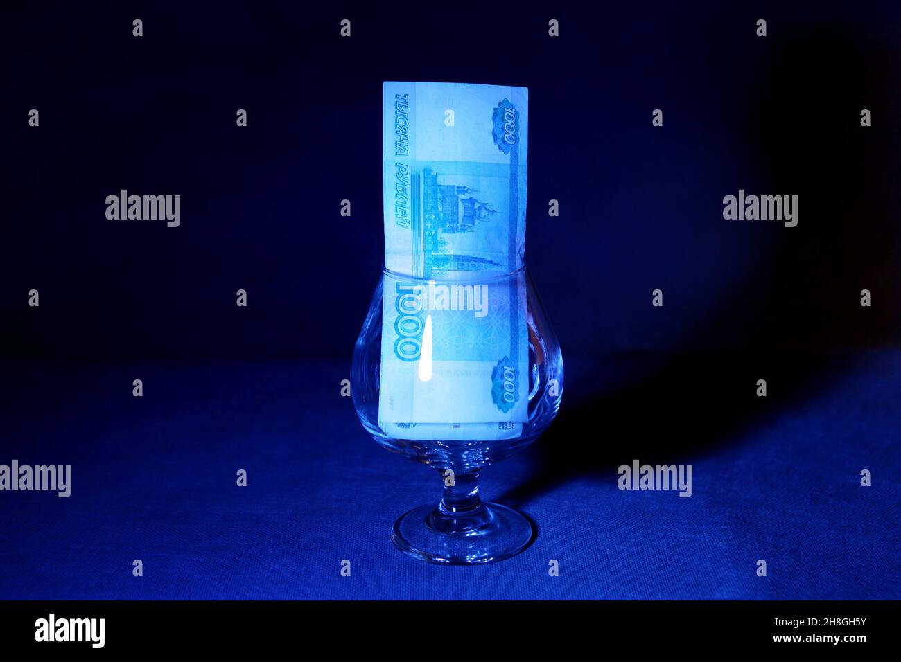 Toned Photo of Russian Currency in the Glass in the Dark Room Stock
