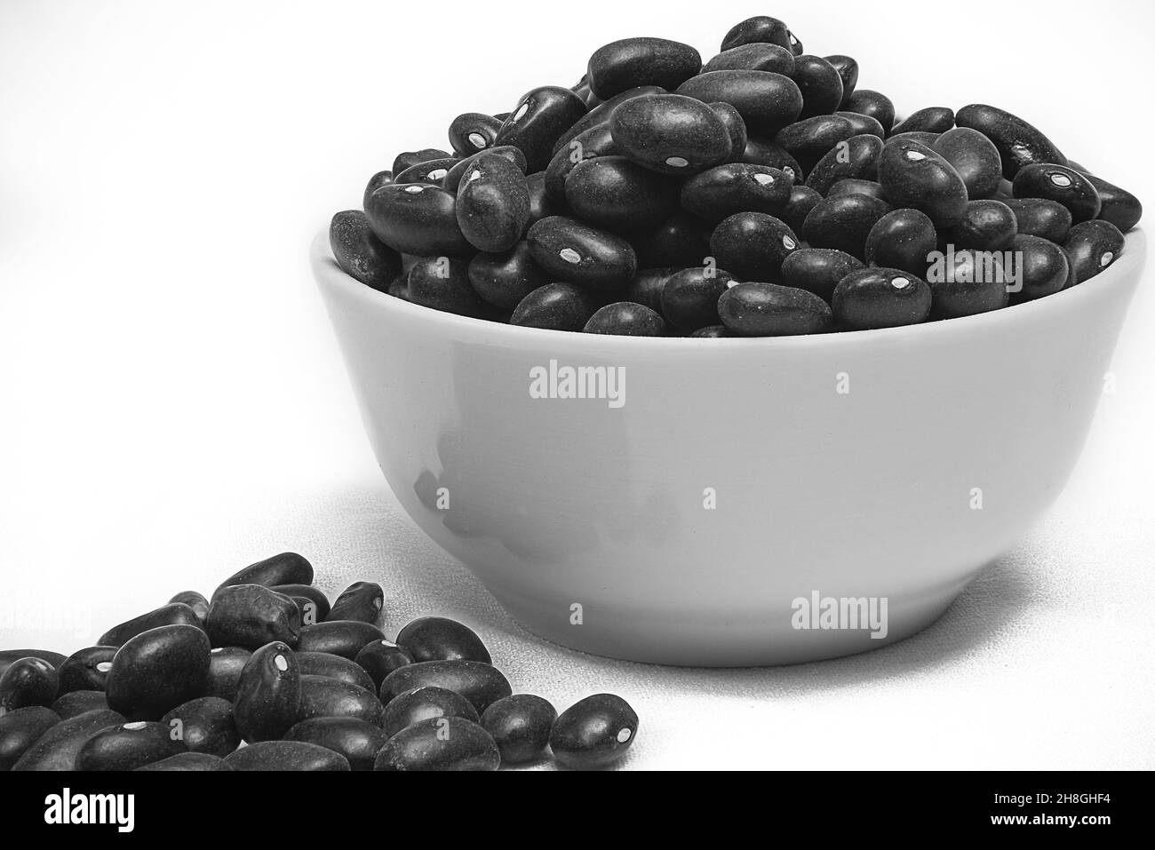 Black beans in a white bowl Stock Photo Alamy