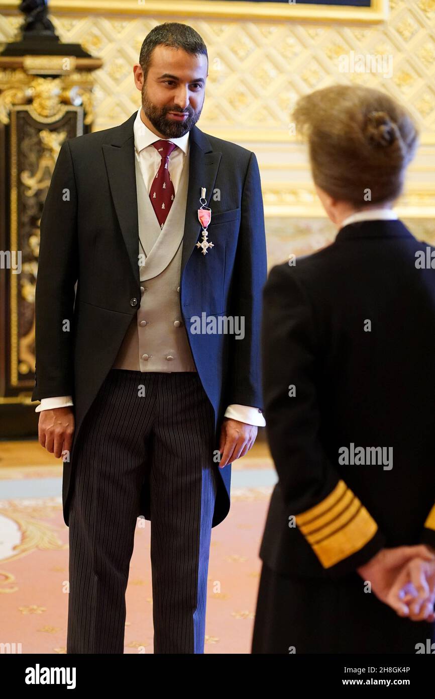 Dr. Ibrar Majid from Walsall is made an MBE (Member of the Order of the British Empire) by the Princess Royal at Windsor Castle. during an investiture ceremony. Picture date: Tuesday November 30, 2021. Stock Photo