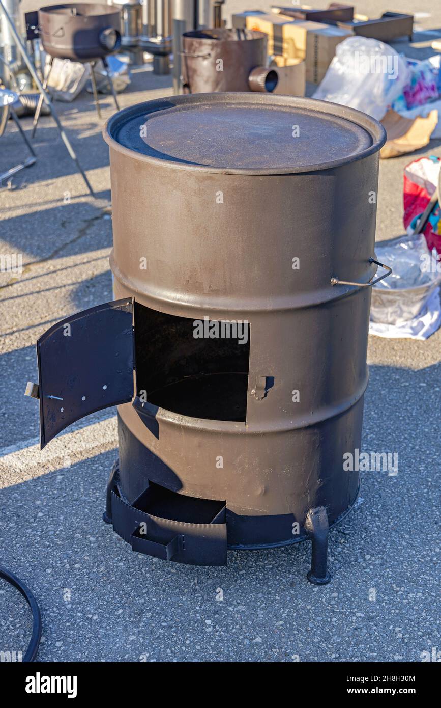 Oil Drum Transformed Into Cooktop Wood Stove Stock Photo - Alamy