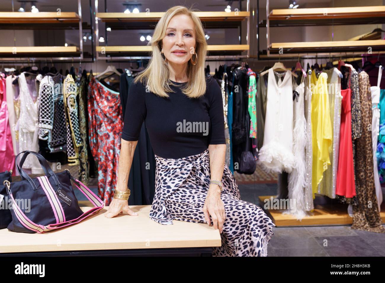 Carmen Lomana poses during a portrait session at the charity market of