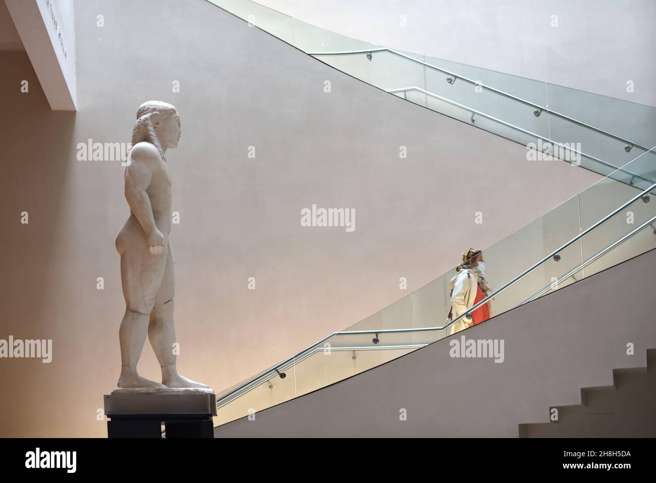 Museum Visitor Climbs the Stairs in the Ashmolean Museum Oxford England Stock Photo