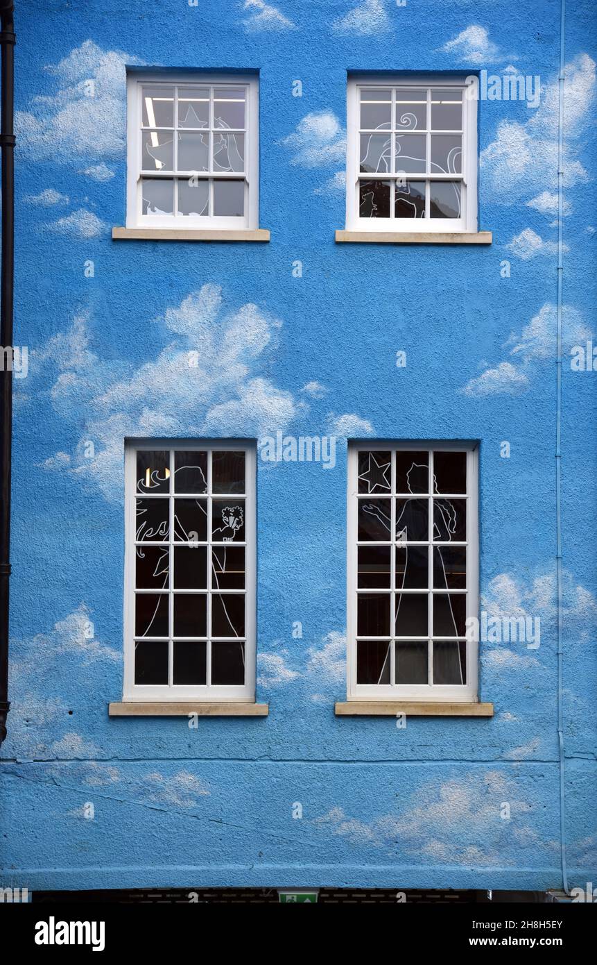 Window Pattern on Blue Wall with Cloud Design on Facade of Old Building The Story Museum in the Old Town or Historic District Oxford England Stock Photo