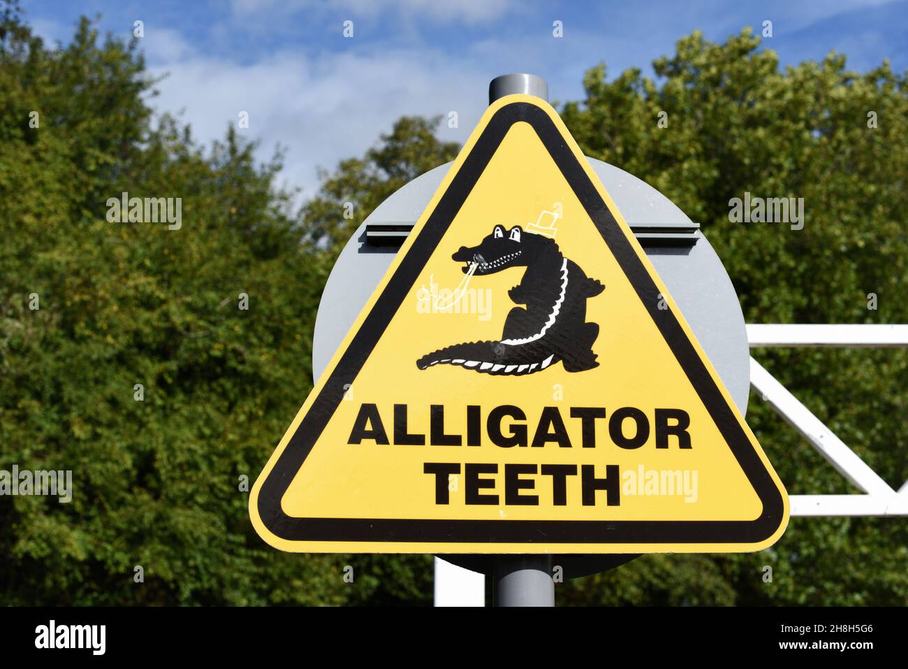 Sign for Alligator Teeth Traffic Control System or Traffic Direction Enforcers at Entrance or Exit to Car Park Stock Photo