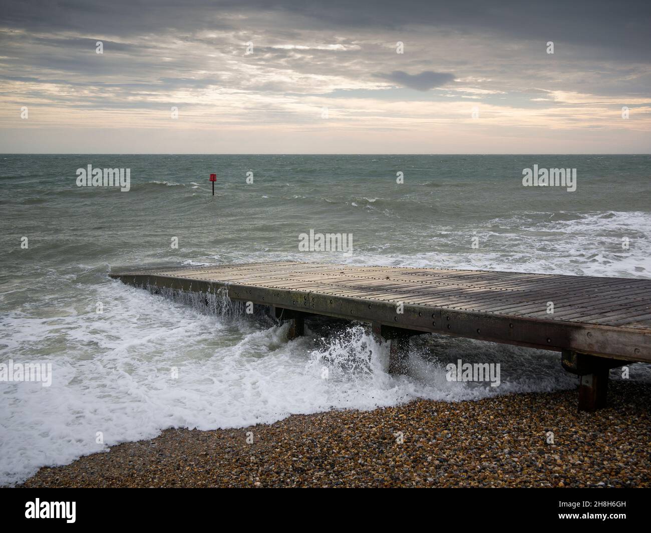 The slipway into the English Channel on East Beach at Selsey, West Sussex, England. Stock Photo