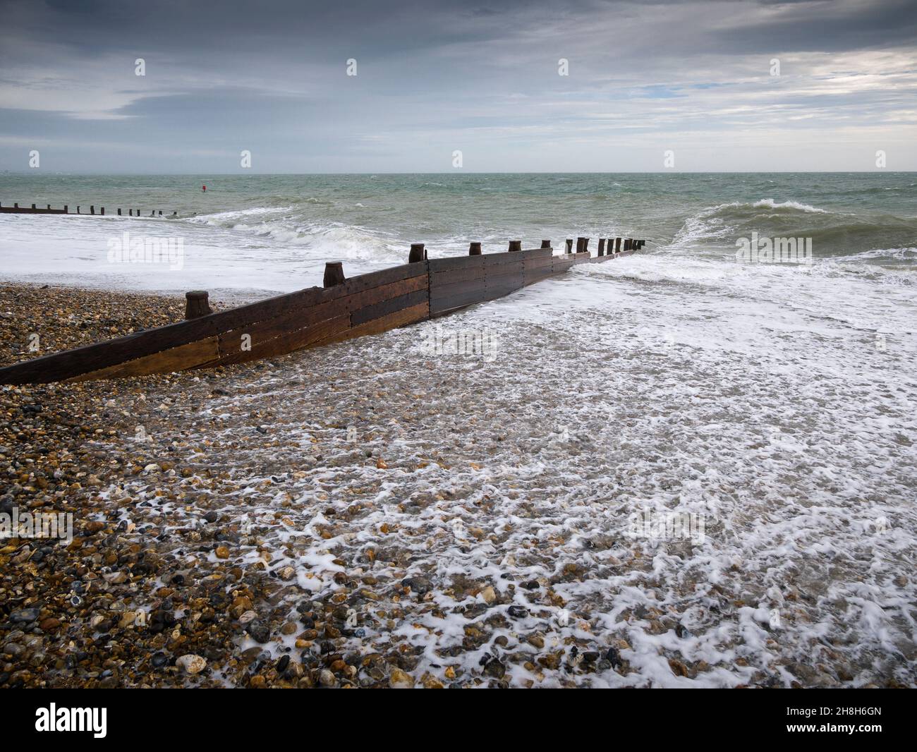 Groyne in the English Channel at East Beach, Selsey, West Sussex, England. Stock Photo