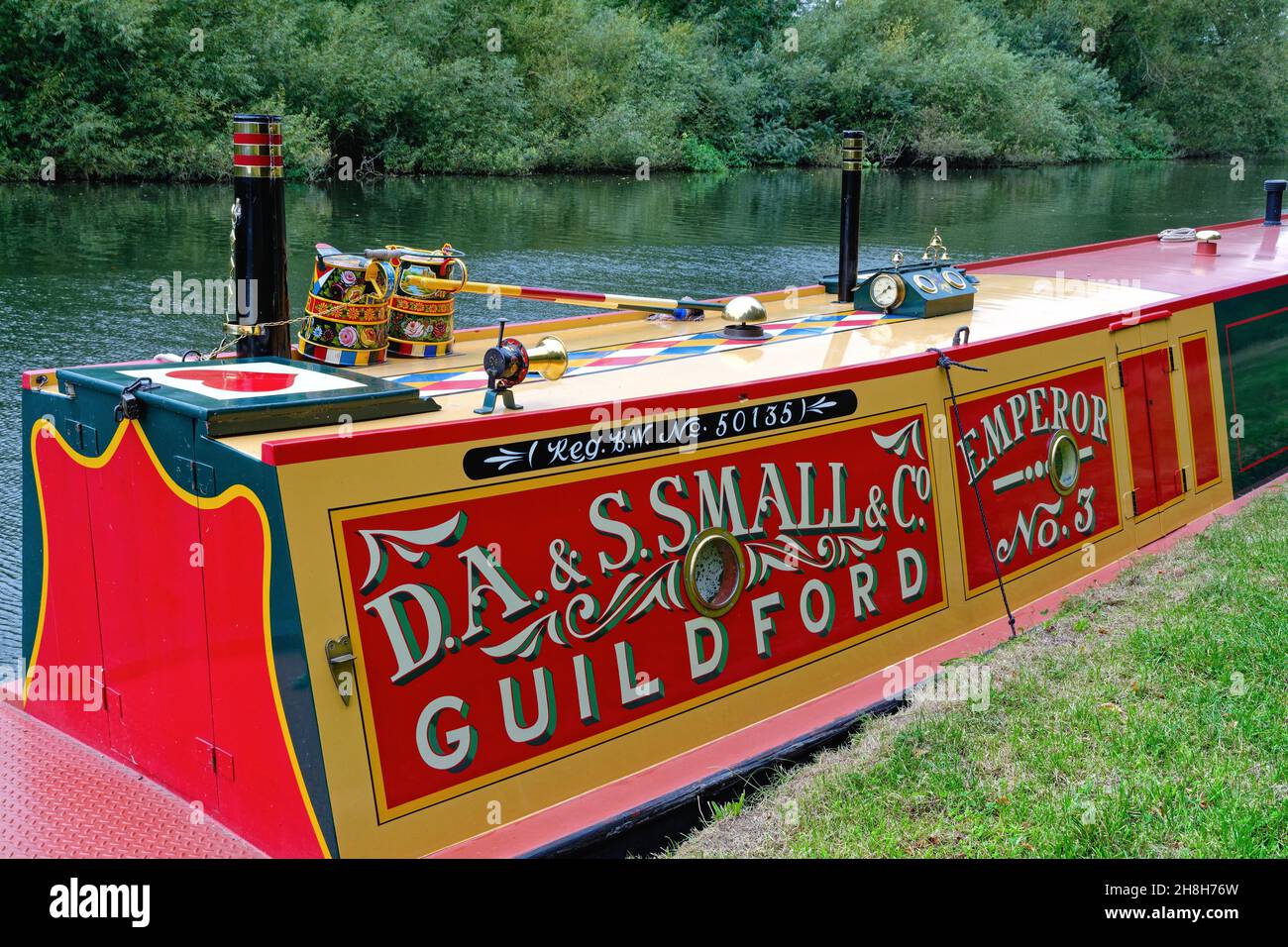 Traditional decorative paintwork on the side of a canal narrow boat moored on the River Thames at Shepperton Surrey England UK Stock Photo