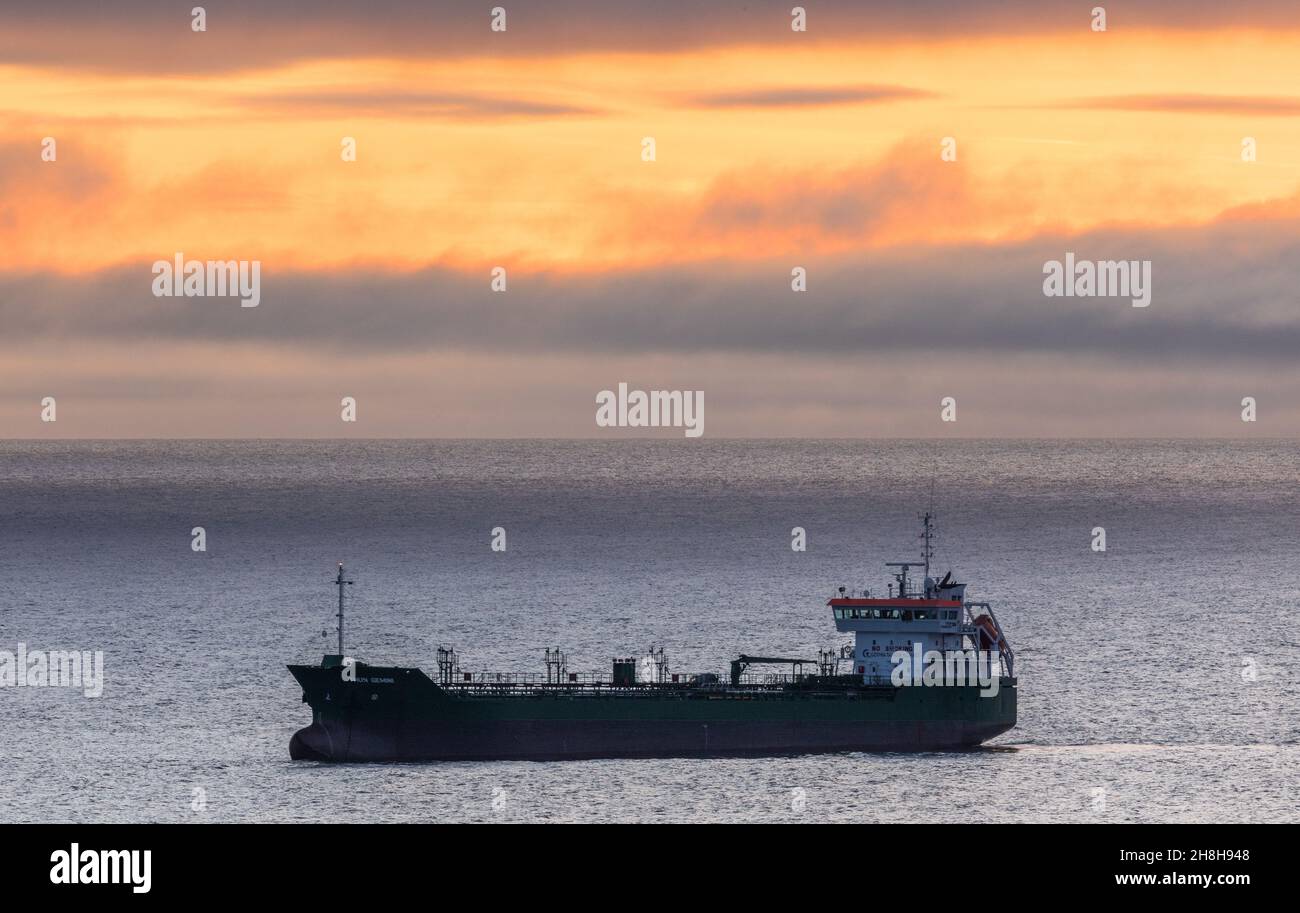 Myrtleville, Cork, Ireland. 30th November, 2021. Oil tanker Thun Gemini at anchor before dawn outside the harbour at Myrleville, Co. Cork, Ireland. - Picture; David Creedon / Alamy Live News Stock Photo
