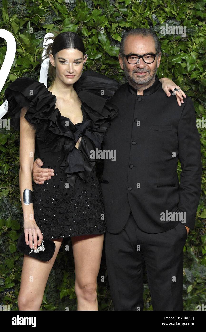 Remo Ruffini and Ophelie Guillermand attending The Fashion Awards 2021 ...