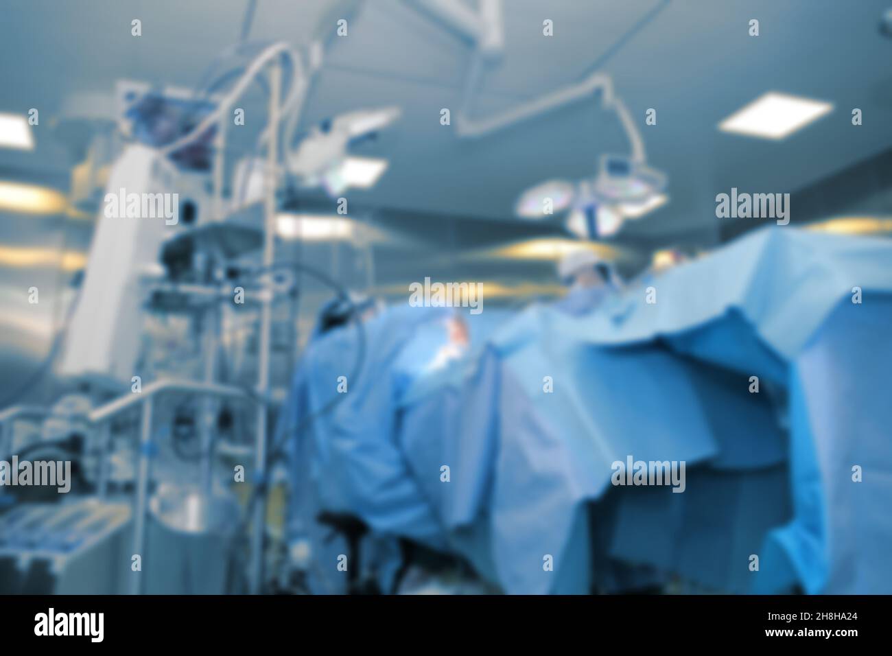 Operating theatre during medical procedure, unfocused background. Stock Photo