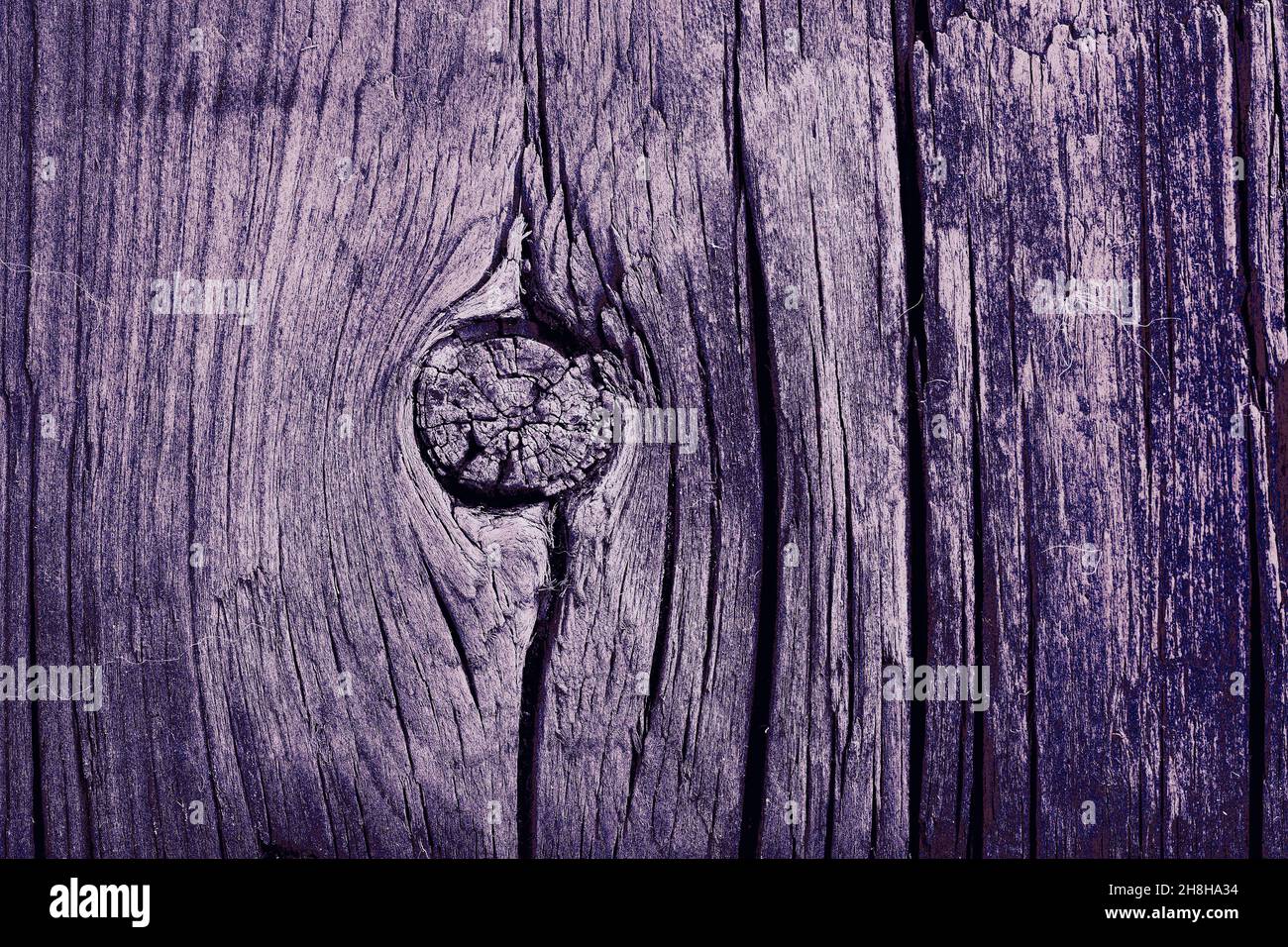 Old cracked wooden plank, textured background. Stock Photo