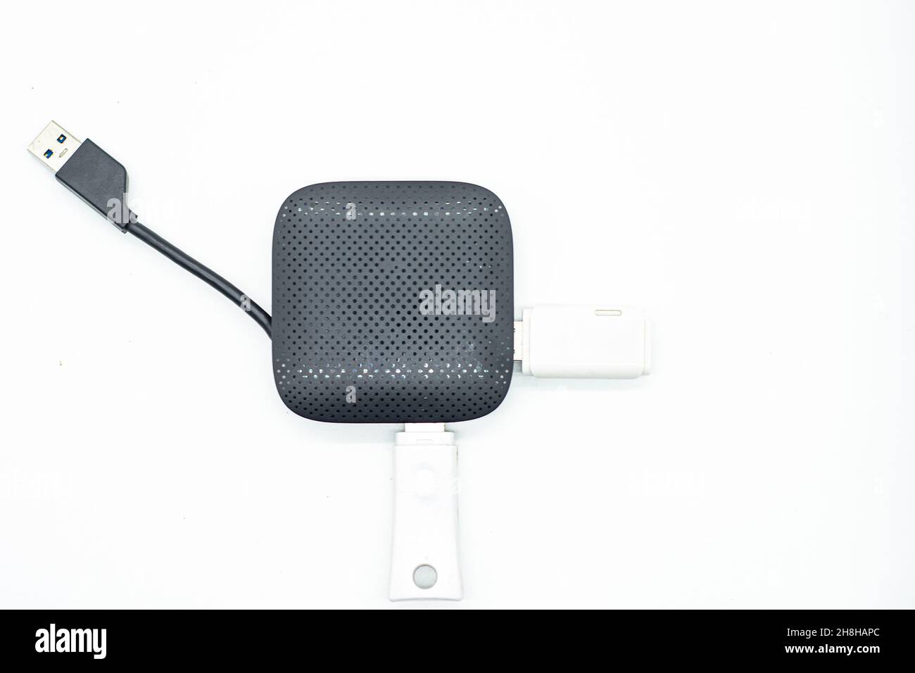 External USB hub and usb flash drives on white background Stock Photo