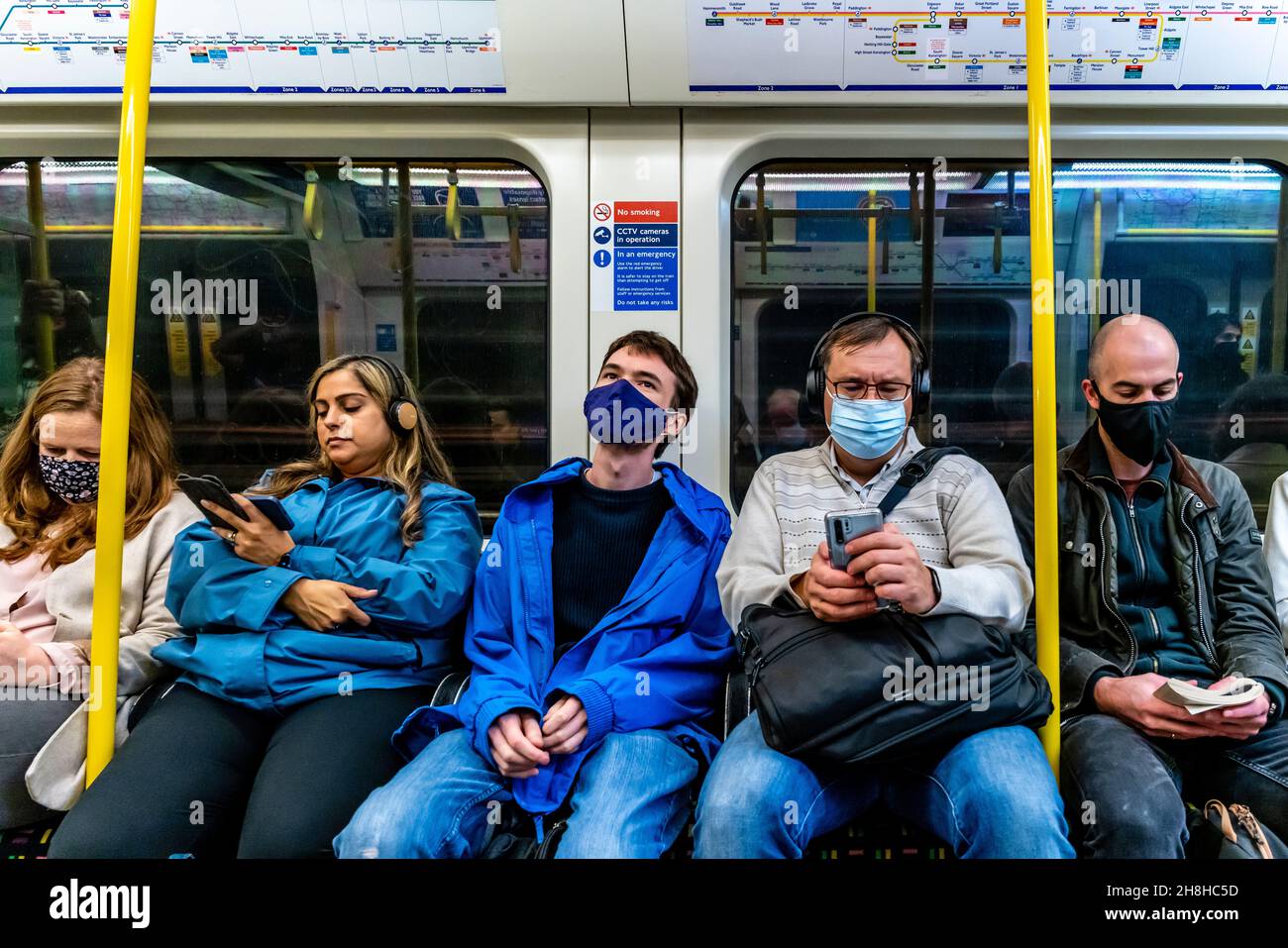 Passengers Wearing Face Masks On A London Underground Train, London, UK