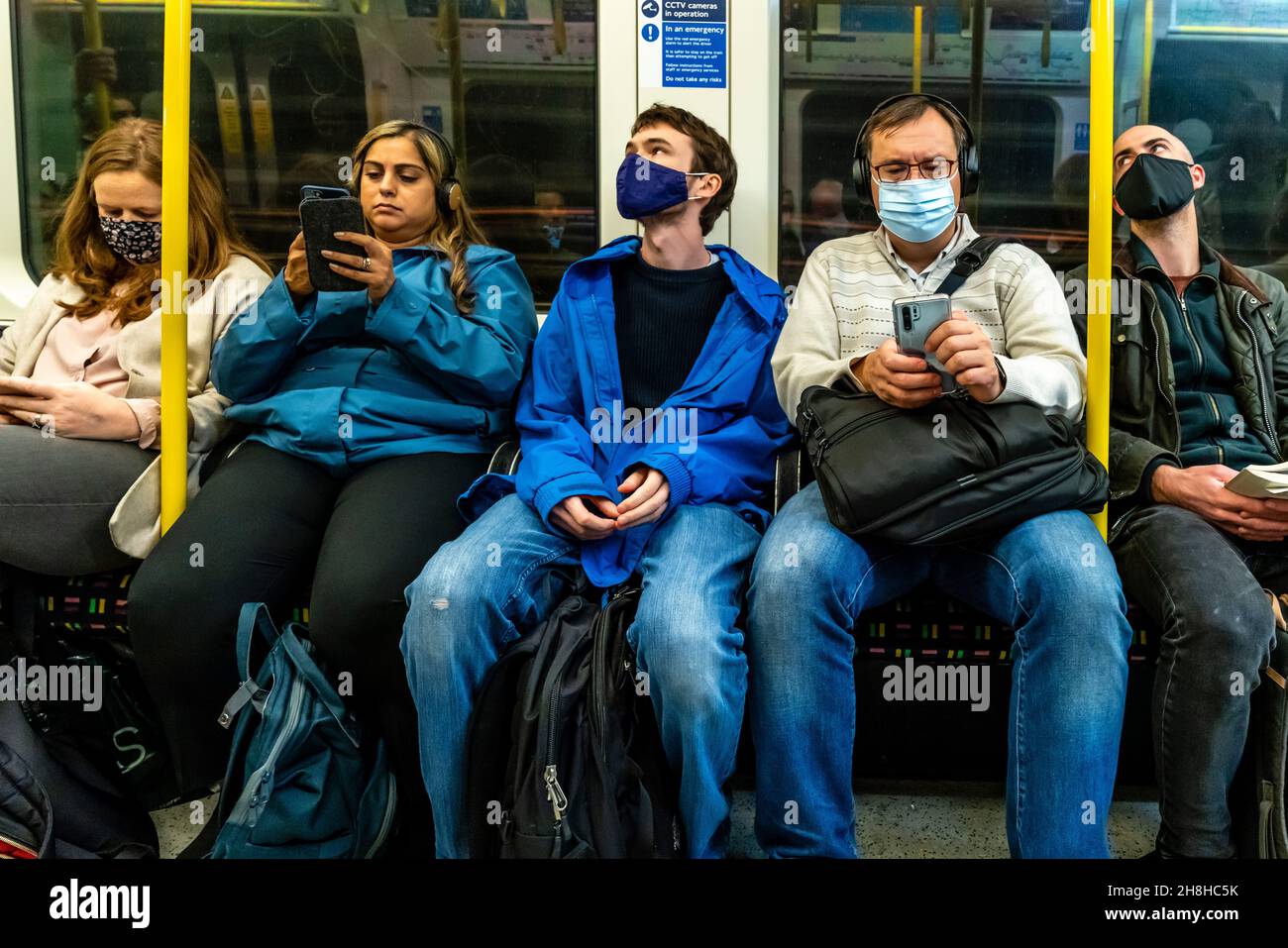 Passengers Wearing Face Masks On A London Underground Train, London, UK