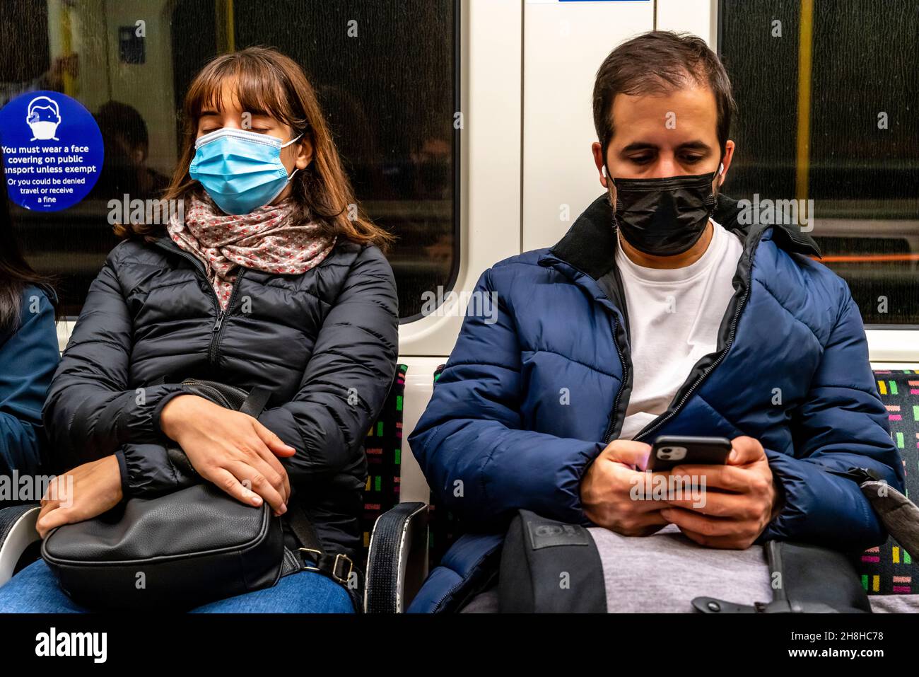 Passengers Wearing Face Masks On A London Underground Train, London, UK