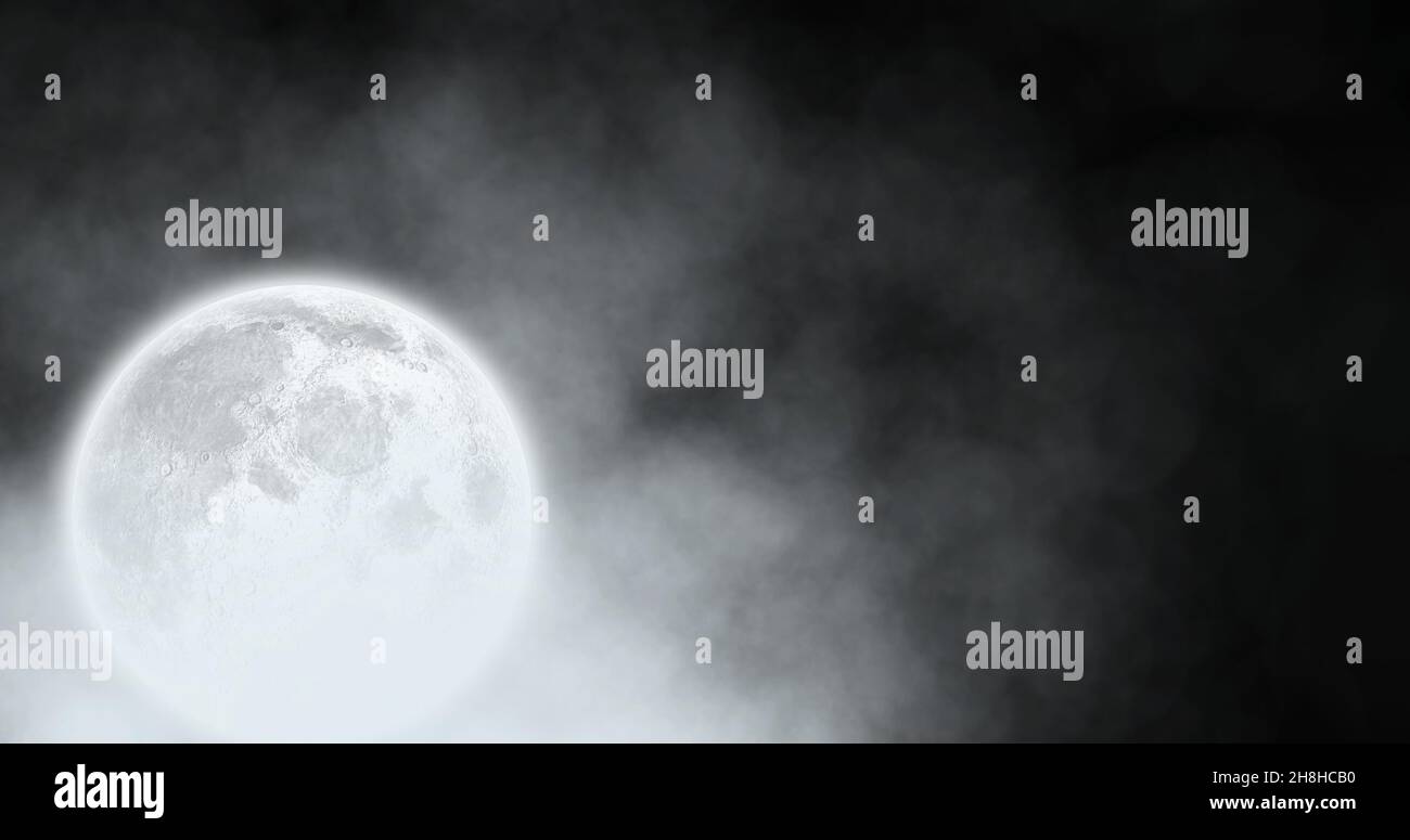 Digital composite of full moon in clouds at night with copy space Stock Photo