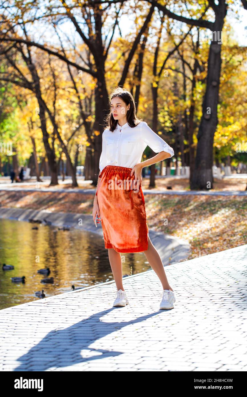 Girl walking legs skirt hi-res stock photography and images - Alamy
