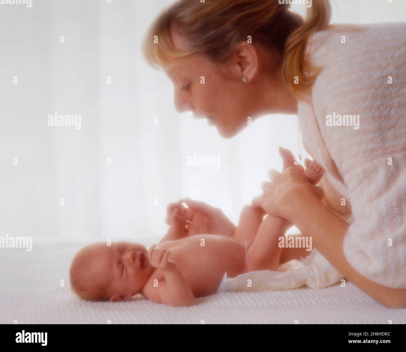 Mother with new born baby. Stock Photo