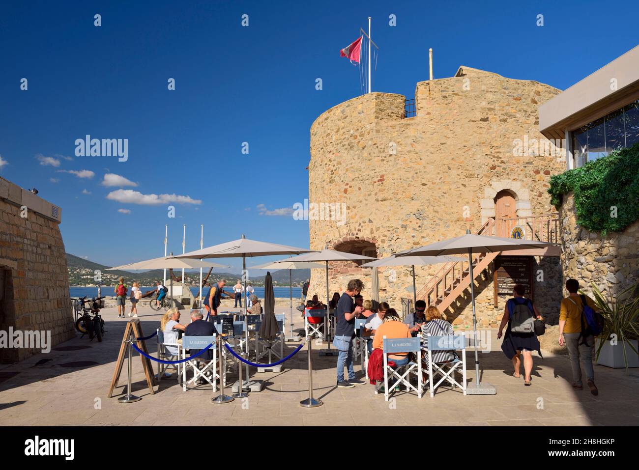 France, Var, Saint Tropez, restaurant's terrace and Portalet tower with view of the gulf and Sainte Maxime in the background Stock Photo