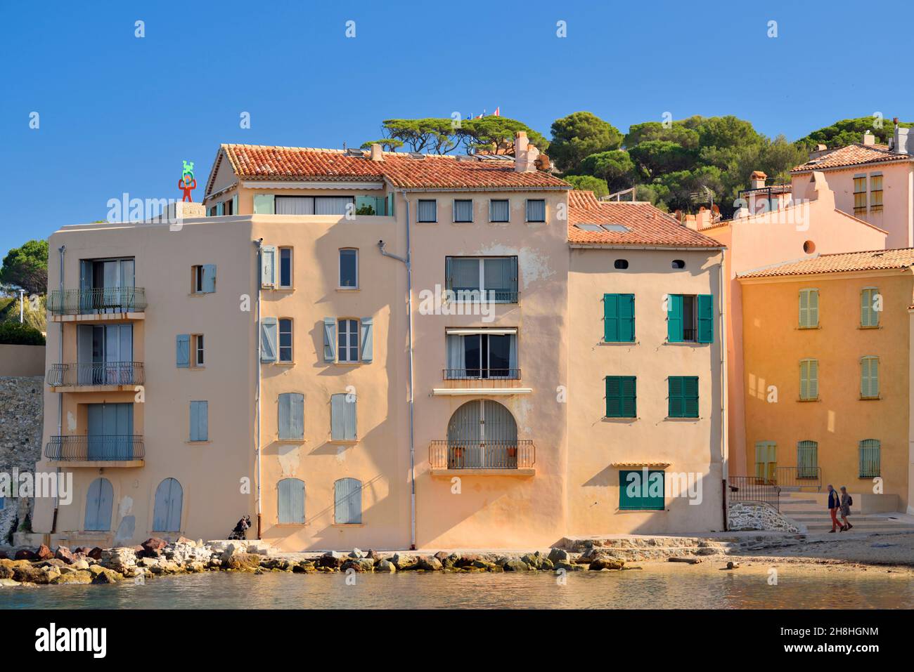France, Var, Saint Tropez, La Ponche District, high houses in facade ochre, yellow or orange colors coloured Stock Photo