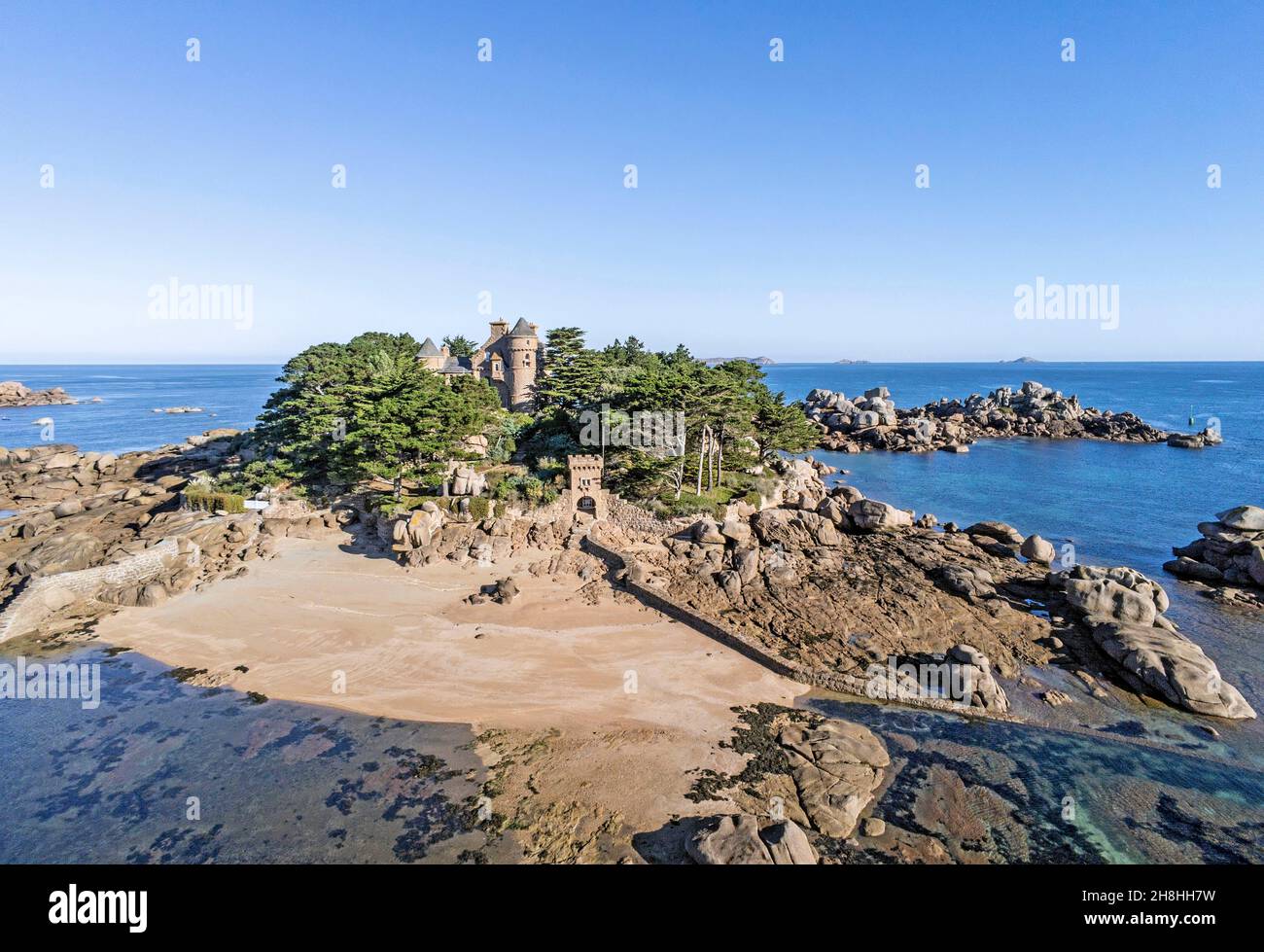 France, Cotes d'Armor, Cote de granit rose (Pink Granite Coast), Tregastel, Costaeres island and castle (aerial view) Stock Photo
