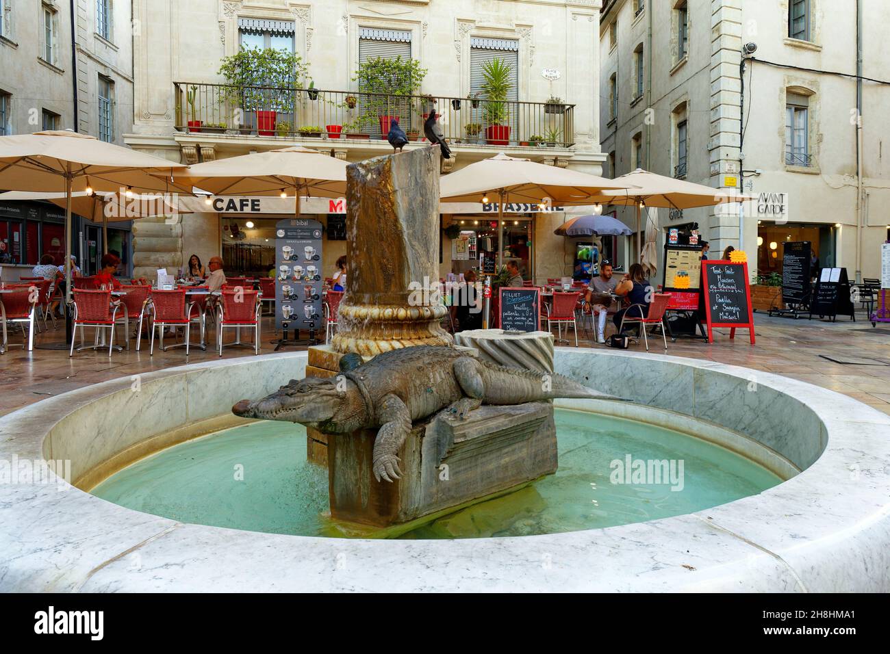 France, Gard, Nimes, old City, Market square (place du Marche), Crocodile Fountain Stock Photo
