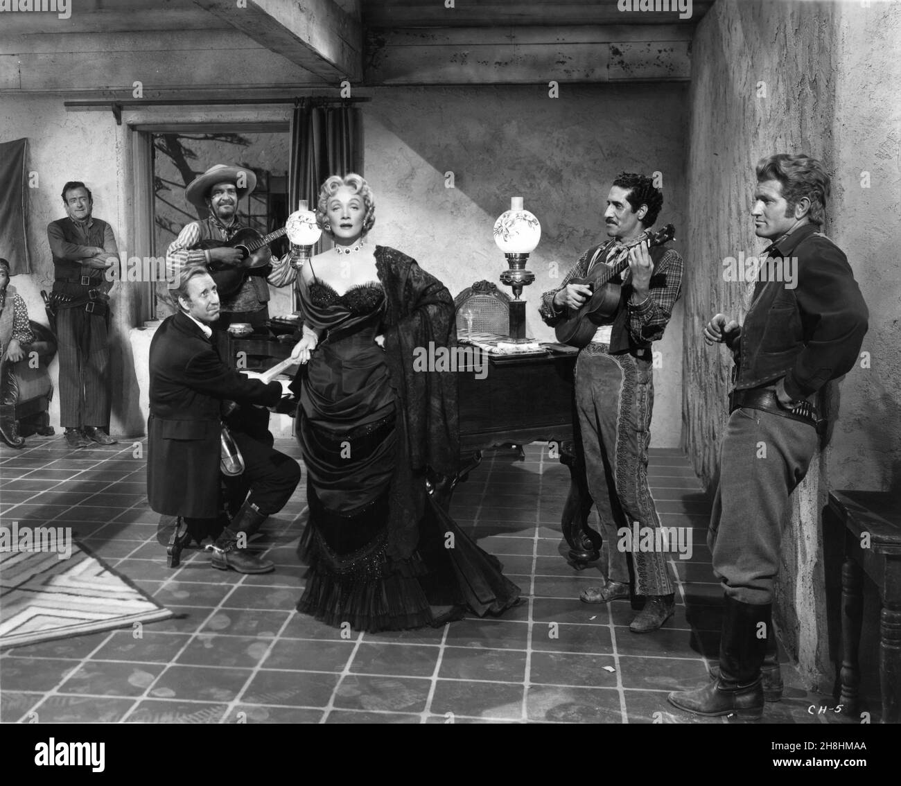 FRANK FERGUSON MARLENE DIETRICH and JOE DOMINGUEZ in RANCHO NOTORIOUS 1952 director FRITZ LANG original story Silvia Richards screenplay Daniel Taradash wardrobe design for Miss Dietrich Don Loper Fidelity Pictures Corporation / RKO Radio Pictures Stock Photo