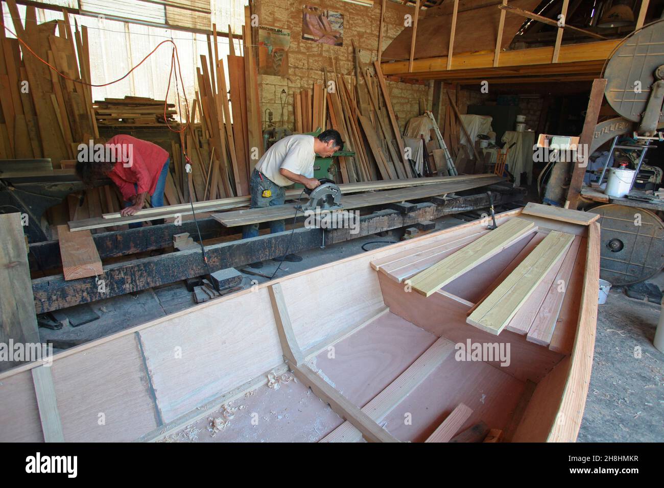 France, Indre et Loire, Saint Germain sur Vienne, Max Pannier, wooden marine carpenter, works on the construction of a toue, flat boat with wide bow made to navigate on the Loire Stock Photo