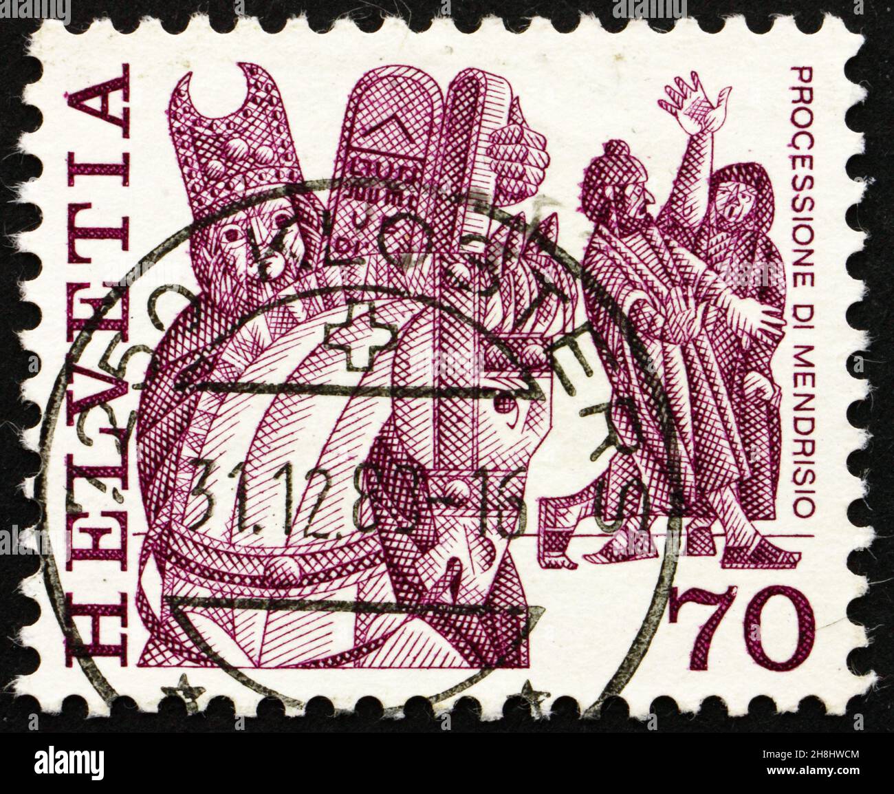 SWITZERLAND - CIRCA 1977: a stamp printed in the Switzerland shows Procession, Horse and Masked Men, Mendrisio, Folk Customs, circa 1977 Stock Photo