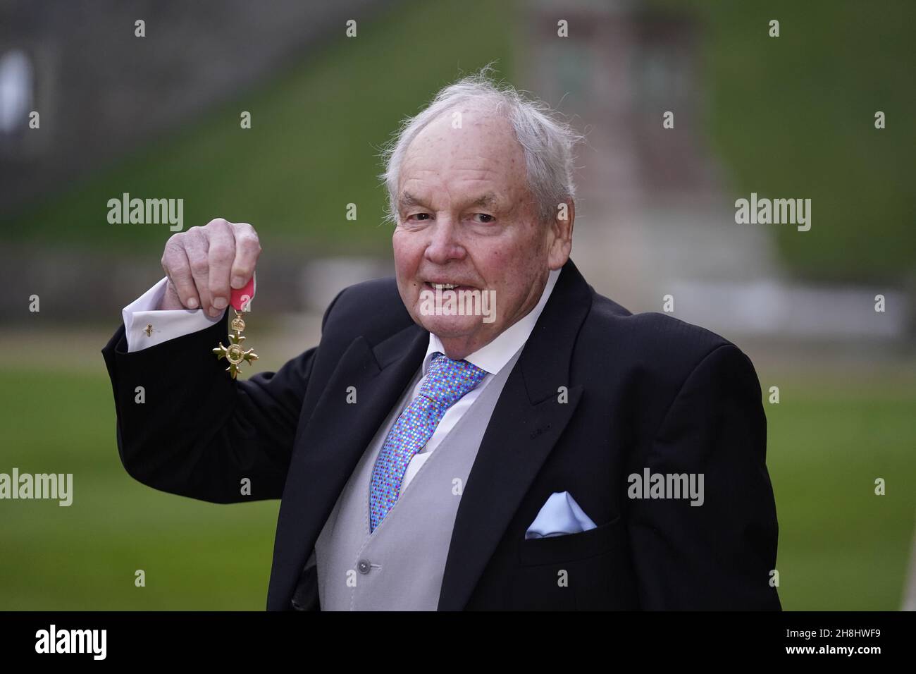 Composer Tony Hatch with the OBE he received from the Princess Royal at