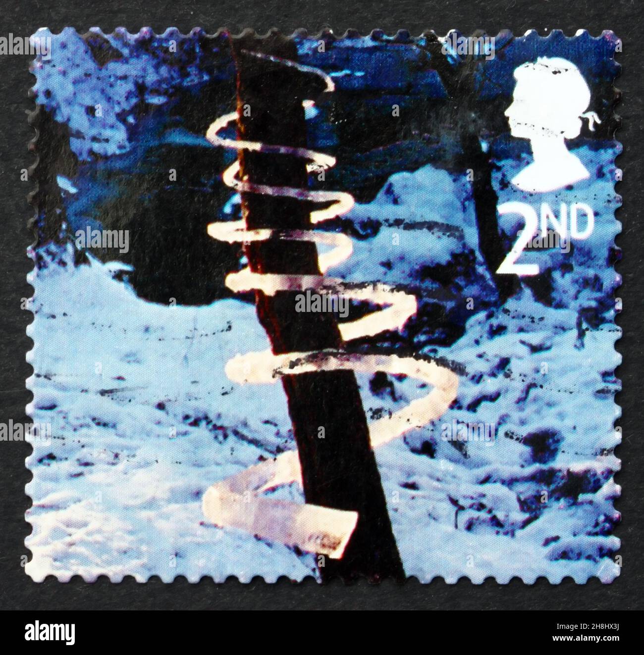 GREAT BRITAIN - CIRCA 2003: a stamp printed in the Great Britain shows Ice Spiral, Ice Sculpture by Andy Goldsworthy, Christmas, circa 2003 Stock Photo