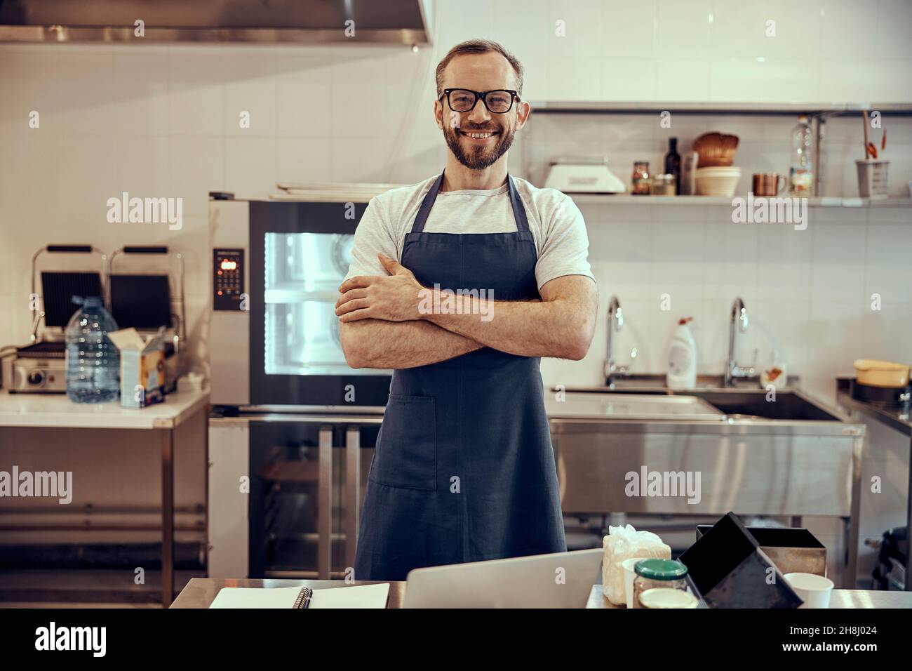 Bartender in apron cafe hi-res stock photography and images - Alamy