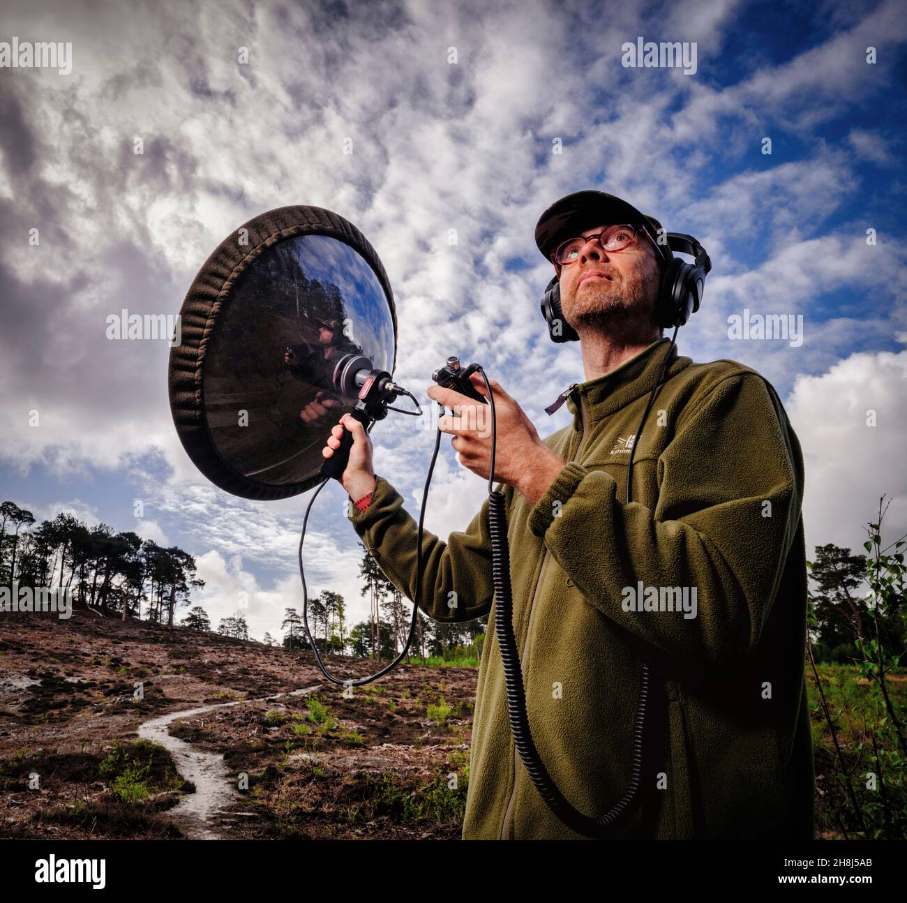 Adrian Thomas of the RSPB with his bird song recording equipment at