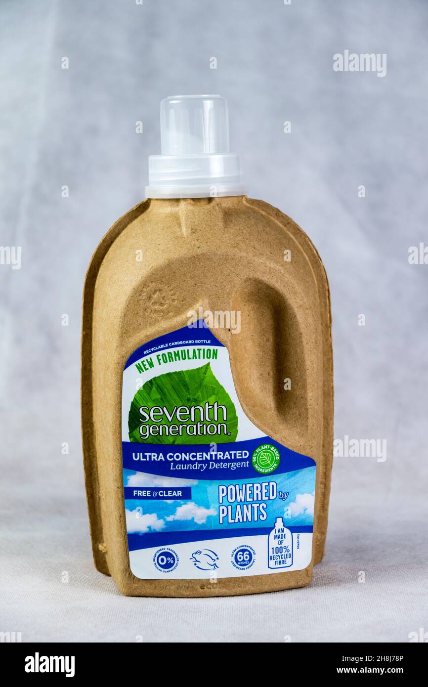 Seventh Generation ultra-concentrated laundry detergent sold in a cardboard bottle surrounding a plastic pouch. Stock Photo