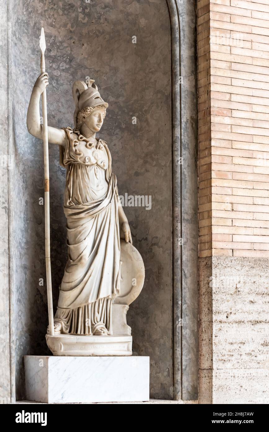 Ancient statue of a roman goddess decorating a niche inside a museum in Italy Stock Photo