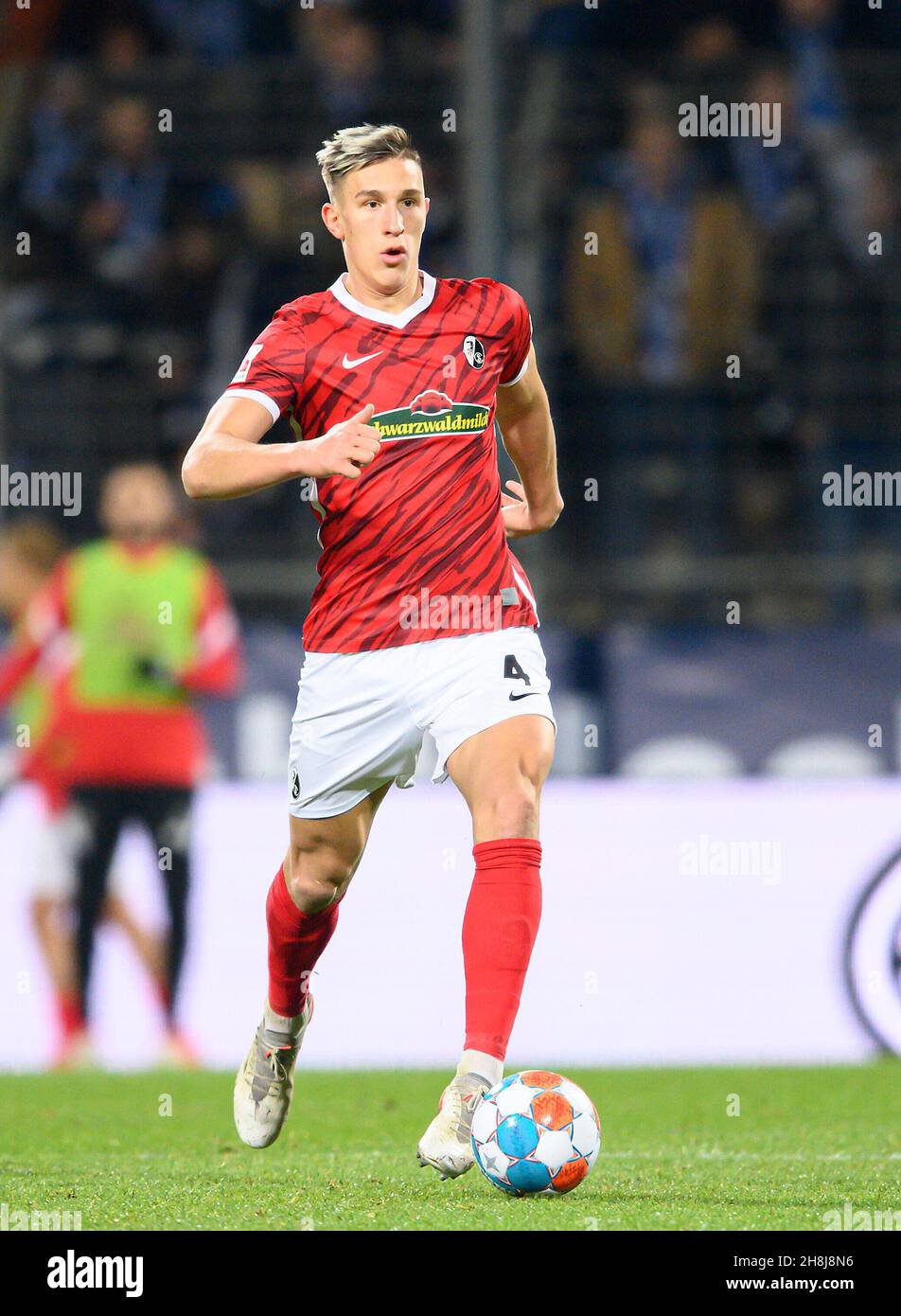 Nico SCHLOTTERBECK (FR) Action, Soccer 1st Bundesliga, 13th matchday, VfL Bochum (BO) - SC Freiburg (FR) 2: 1, on November 27th, 2021 in Bochum/Germany. #DFL regulations prohibit any use of photographs as image sequences and/or quasi-video # Â Stock Photo