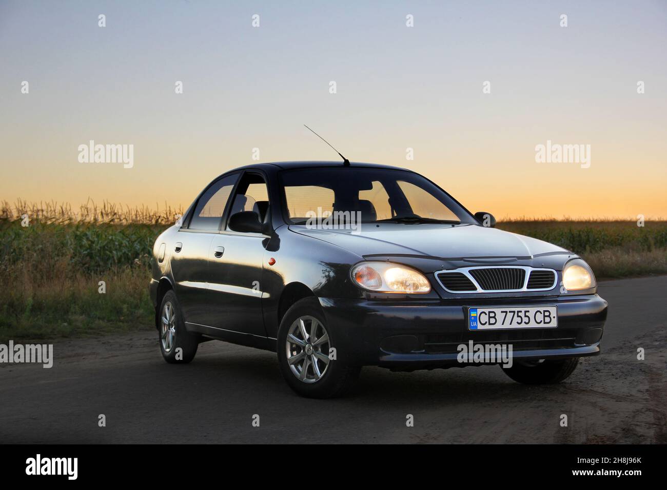 Chernihiv, Ukraine - September 9, 2020: Daewoo Sens on the background of a field and sunset Stock Photo