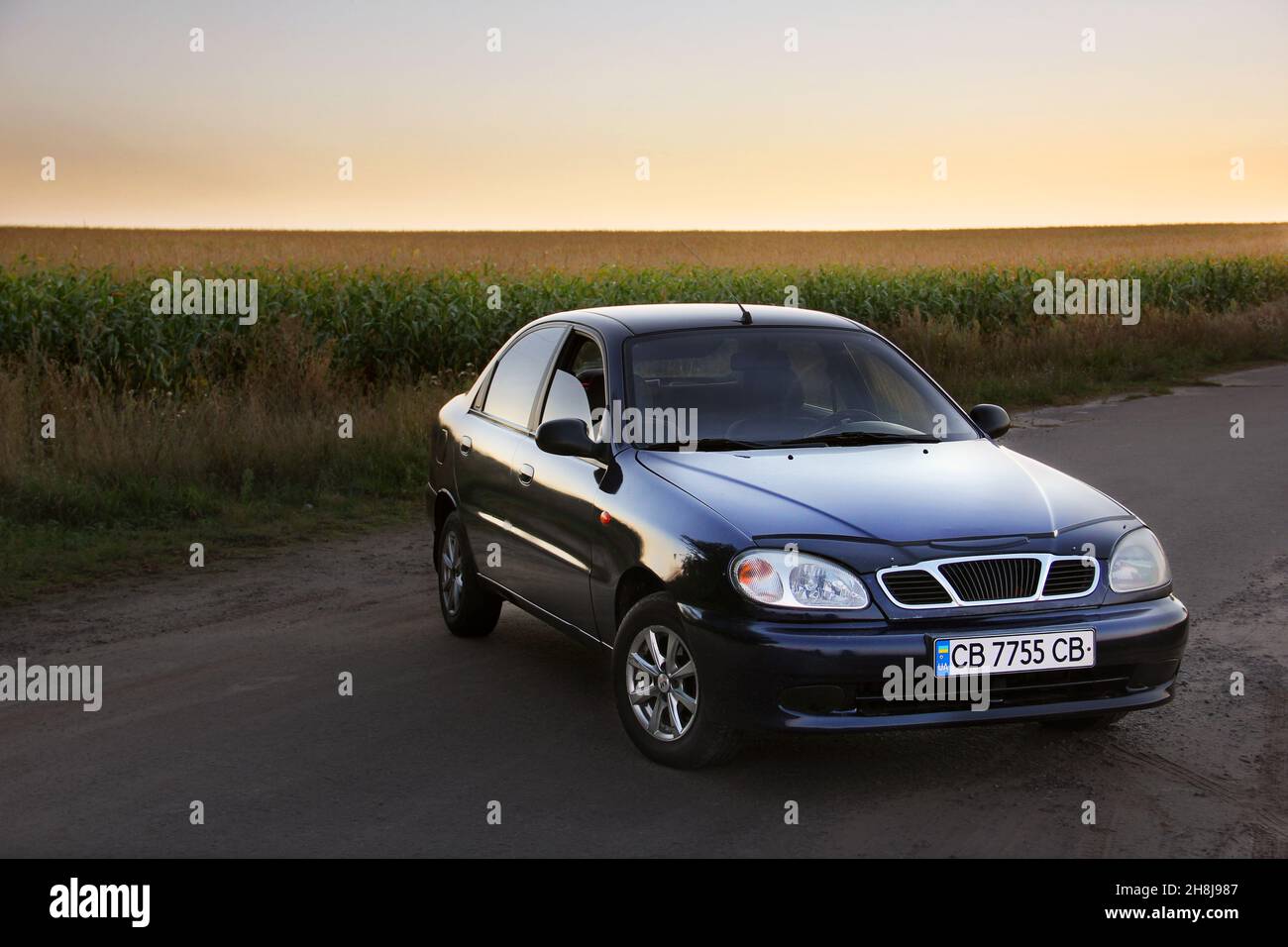 Chernihiv, Ukraine - September 9, 2020: Daewoo Sens on the background of a field and sunset Stock Photo