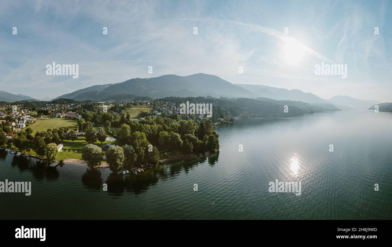 Summer day at Lake Millstatt in Carinthia. Scenic aerial panorama of the touristic region in South of Austria. Stock Photo