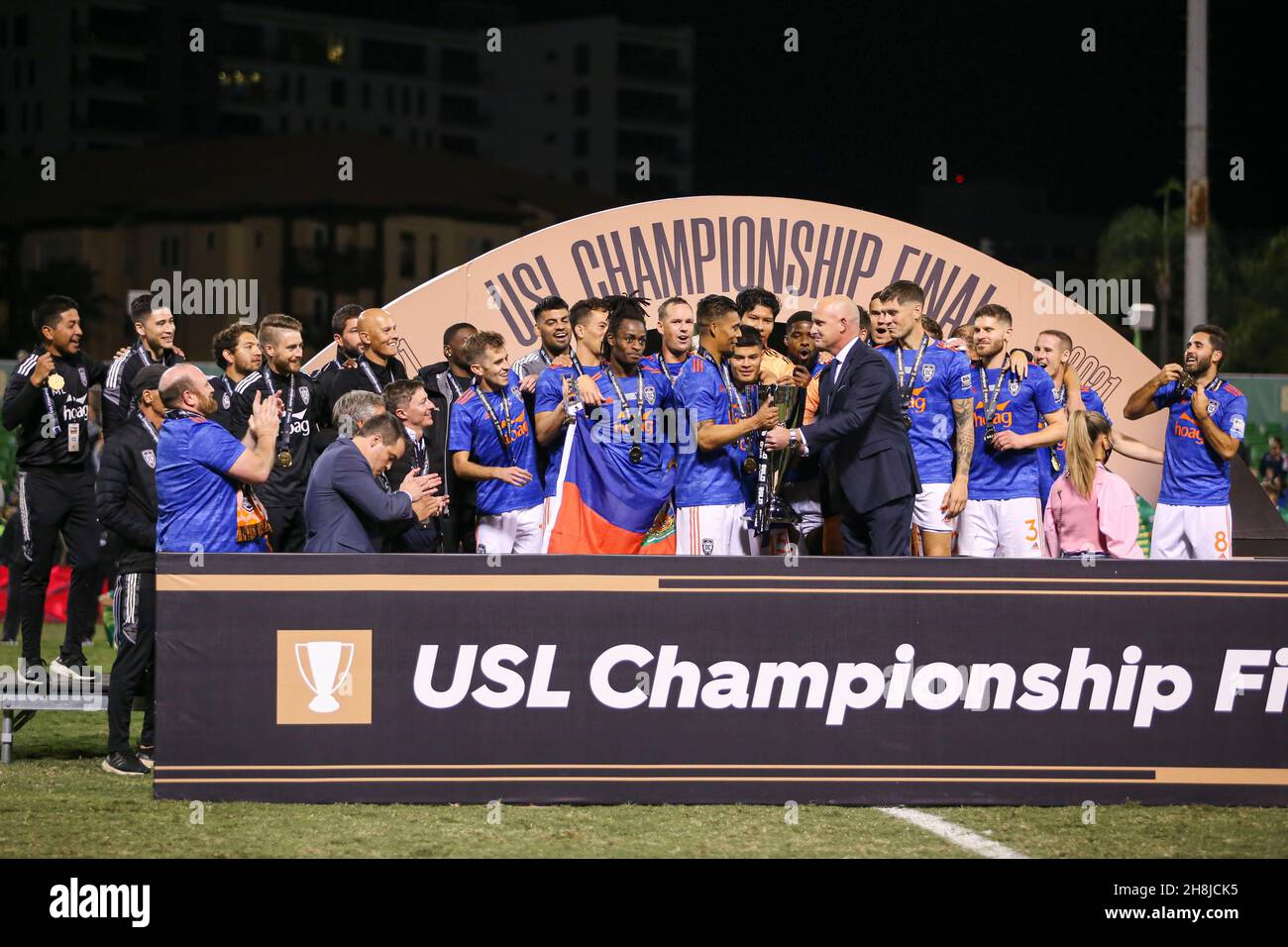 St. Petersburg, FL USA;  USL president Jake Edwards presents the trophy to Orange County SC captain and defender Michael Orozco (6) during the USL Cha Stock Photo