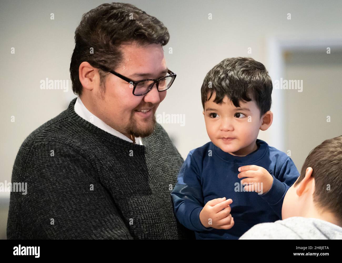 Refugee Hussain Saeedi Samangan and his one year old son Arian who met the Duke of Cambridge during his visit to a hotel in Leeds, which is being used to accommodate refugees evacuated from Afghanistan. Picture date: Tuesday November 30, 2021. Stock Photo
