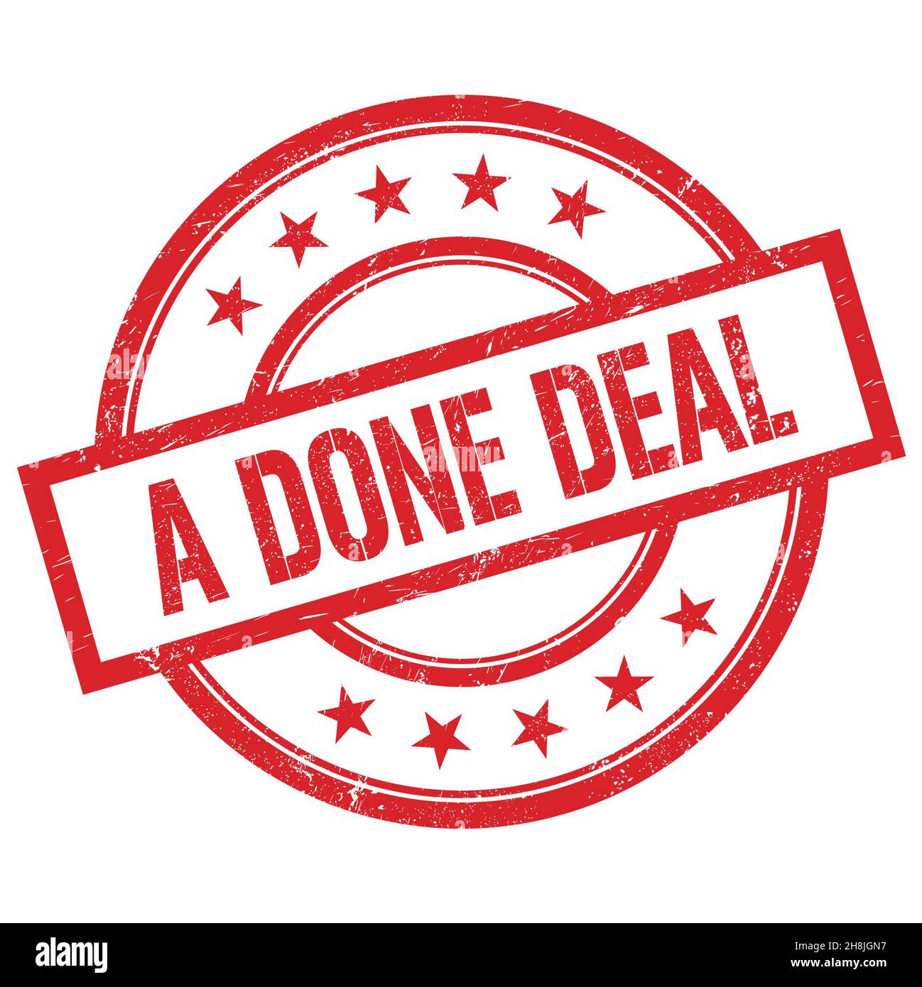 A DONE DEAL text written on red round vintage rubber stamp. Stock Photo