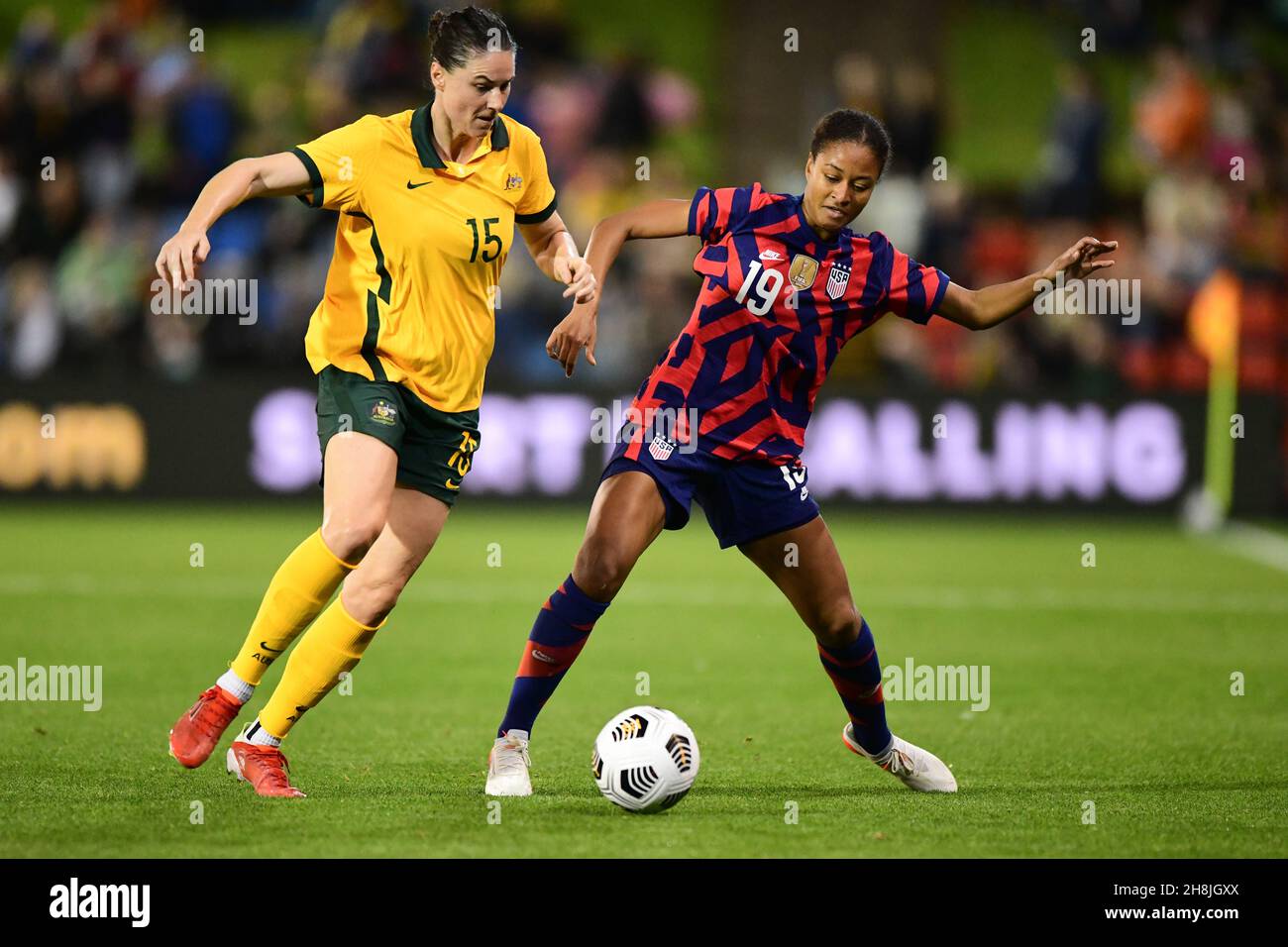 Newcastle, Australia. 30th Nov, 2021. Emily Gielnik (L) of Australia