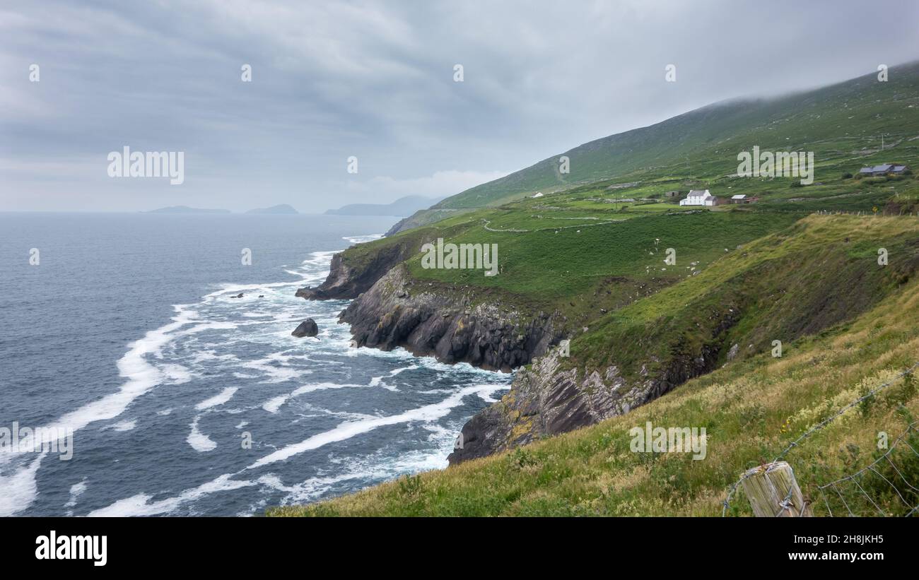 View from Slea Head, Dunquin on the Dingle Peninsula in west County Kerry, Ireland. The Blasket Islands can be seen in the distance. Stock Photo