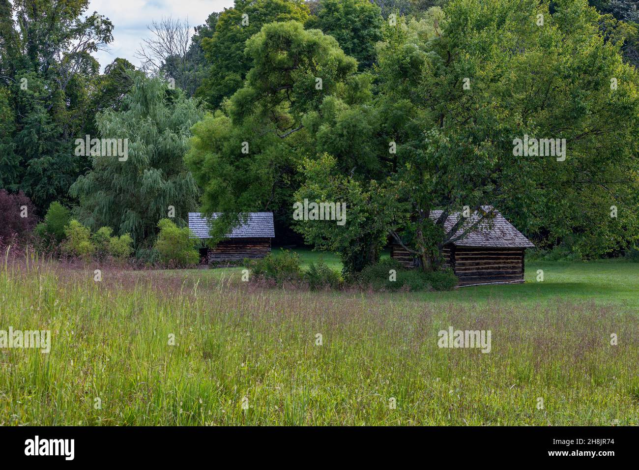 Johnson City, Tennessee, USA - September 5, 2021:  Spring house and smoke house at the historical site. Stock Photo