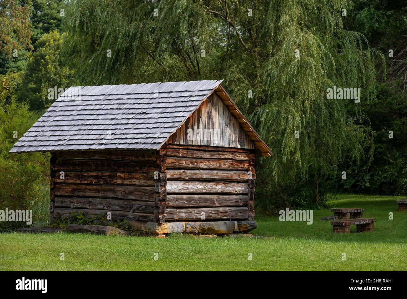 Johnson City, Tennessee, USA - September 5, 2021: smoke house at the historical site of Tipton-Haynes property Stock Photo