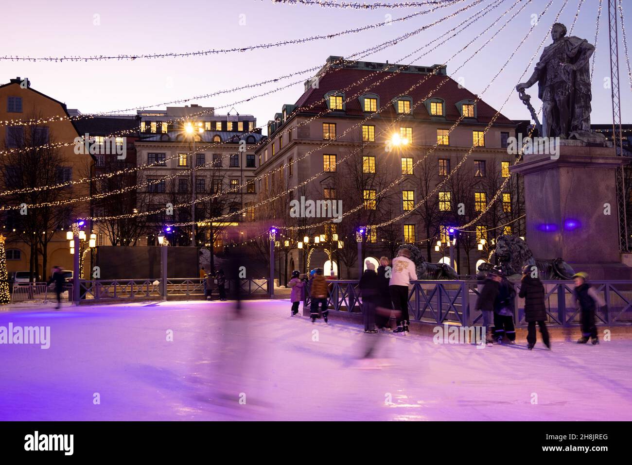 Winter in Stockholm. Ice skating in the square in Kungstradgarden