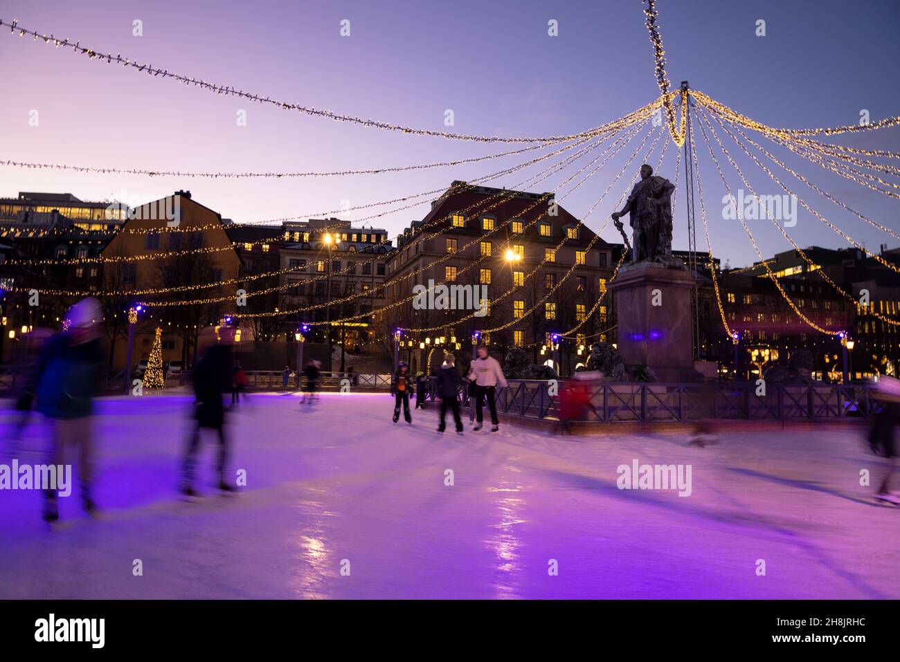 Winter in Stockholm. Ice skating in the square in Kungstradgarden