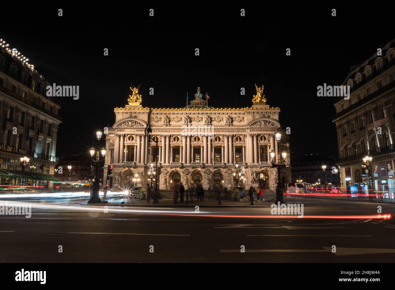 Famous Paris Opera at Night, lights of the traffic leading around ...